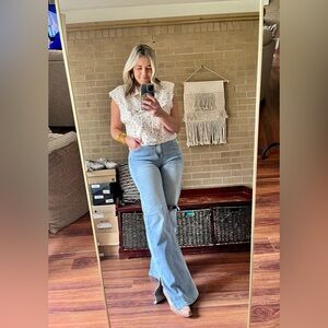 POL sleeveless denim vest with cream base and pink floral print